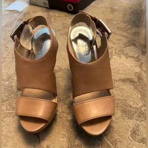 Michael Kors nude pumps with wood heel. Worn once on patio to check fit